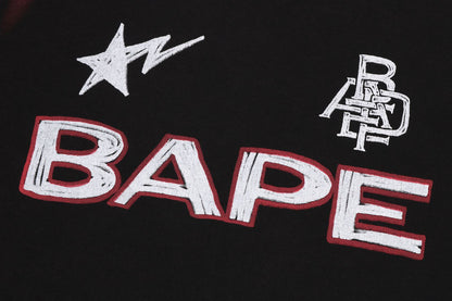 BAPE HEAVY WASH HAND DRAW FOOTBALL MULTI LOGO RELAXED FIT TEE
