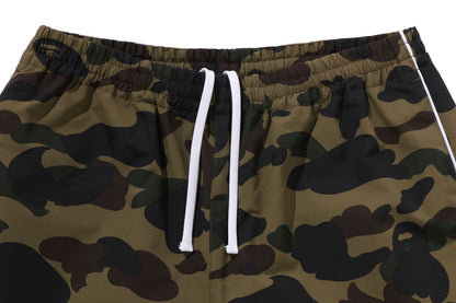 BAPE 1ST CAMO TRACK PANTS